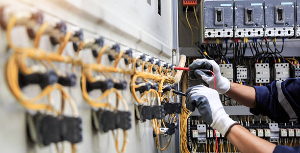 Professional Electrician technician working in Century, FL